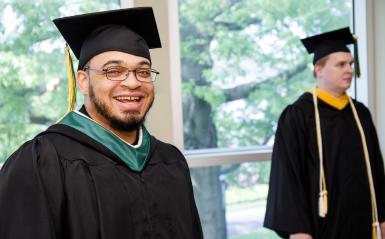 Jeff Fisher wearing his cap and gown
