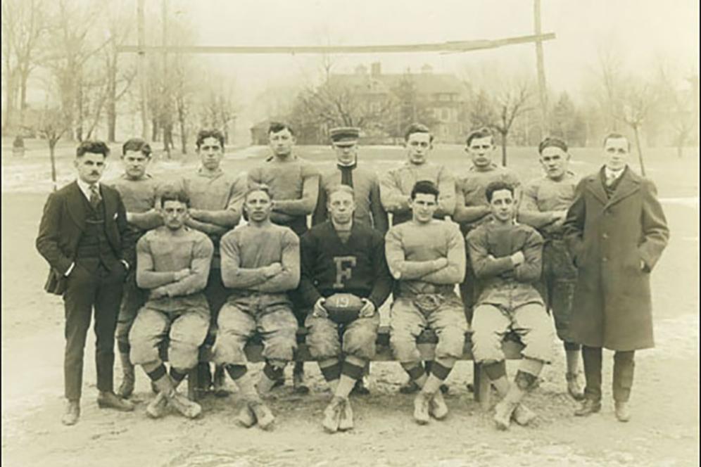 Football players lined up in three rows