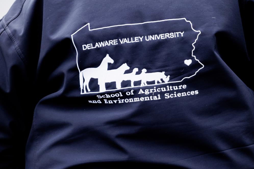 A photograph of the back of a jacket which read School of Agriculture and Environmental Sciences.