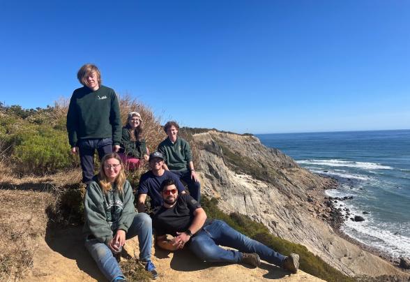 Students are at the soil judging competition by an ocean.