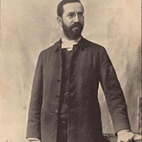 Old black and white photo of The Farm School Founder, Joseph Krauskopf, dressed in formal attire.