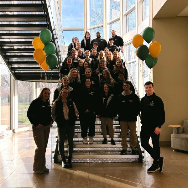 Our 2024 Rambassadors lined up for a photo on the steps of LSB