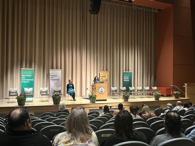 Drs. Alica Shenko and Allison Buskirk-Cohen on stage. 